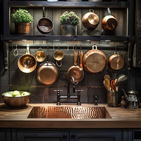 Rustic kitchen corner with wooden shelving, copper cookware, and potted plants, showcasing a blend of form and utility. Dark Green And Copper Kitchen, Black And Copper Kitchen, Copper Pots And Pans, Green Kitchen Walls, Rehab Addict, Wooden Shelving, Ideas Cocina, Above Sink, Above The Sink