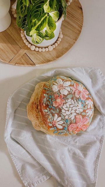 Bread With Design On Top, Sour Dough Painting, Painting On Sourdough Bread, Sourdough Bread Paint, Painting On Sourdough, Painting On Bread, How To Paint Sourdough Bread, Bread Making Aesthetic, Easter Sourdough Bread