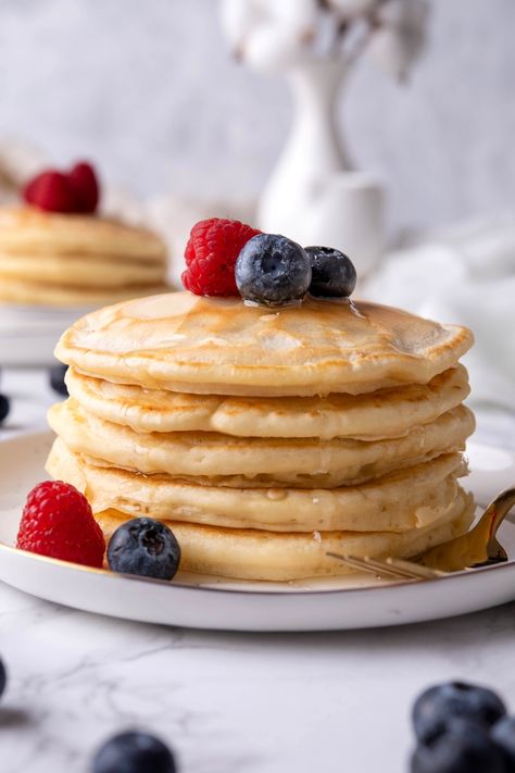 These no milk pancakes can rival any of the best regular pancakes out there. Seriously, this recipe makes the most incredibly soft and... No Milk Pancakes, Pancake Recipe With Water, Pancake Recipe No Milk, Pancakes Without Milk, Pancake Recipe Without Milk, Best Fluffy Pancakes, Vegan Recipes Gluten Free, Dairy Free Pancake Recipe, Milk Pancakes