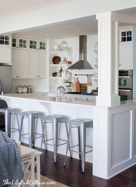 White Cottage Kitchen trimmed out support beam. Corbels. Raised bar. (We do not have room for stools.) Kitchen Island With Columns, Kitchen Columns, Corner Counter, White Cottage Kitchens, White Cottage Kitchen, Kitchen Layouts With Island, Kitchen Peninsula, Support Beam, Dining Room Remodel