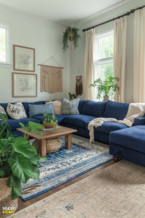 Navy Blue And Yellow Living Room Ideas, Navy Blue Sofa And Cream Living Room, Navy Couch White Walls, Navy Blue And White House Interior, Living Room With Royal Blue Sofa, Blue Couch Inspiration Living Rooms, Blue Black Wood Living Room, Blue Sofa Colorful Living Room, Living Room Blue Palette