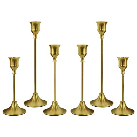 PRICES MAY VARY. VINTAGE VISUAL FEAST: Eelegant and Premium Candle Stick Holder set, the candelabra at different heights create an undulating candlelight creating a romantic and warm atmosphere TAPER CANDLE HOLDE: Skilled craftsmen use high quality metal to create each luxurious candle holder. The sturdy and heavy round base has a non-slip velvet base that does not shake easily CANDLESTICKS HOLDER BULK: The candle holders are available in three lengths - S:6.0 '' X 2.5''; M:7.6'' X 2.5''; L:9.3' Brass Candlesticks Decor, Candle Dinner Table, Round Dinner Table, Led Taper Candles, Candlestick Centerpiece, Decor Centerpieces, Vintage Candlestick Holders, Candle Sticks Wedding, Candle Stick Decor