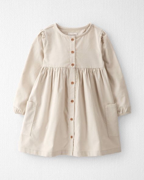 Here's another take on our super soft corduroy. Featuring a long sleeve design and certified organic cotton, you can dress up your little one in a look that's made for fall days and the sweetest memories. Crafted in the purest organic fabrics and sustainable materials, Little Planet is a return to simplicity. Thoughtful essentials and timeless pieces to gift or to hold on to. Parent Dr, Girls Frocks, Planet Clothing, Mini Outfit, Long Sleeve Ruffle Dress, Cozy Dress, Button Front Dress, Corduroy Dress, Toddler Girl Dresses