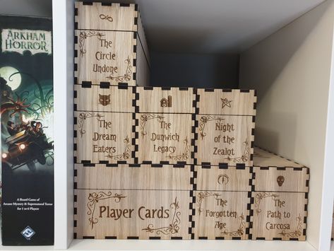 This Box has been purposefully made to store the cards for Arkham Horror LCG vertically in smaller more accessible parts. As the game has grown a single storage solution became too large to easily bring the game to the table, these boxes solve that problem. A full cycle will comfortably fit within a box and the longer box will hold the return to cards and dividers (sold separately) as well for each encounter and 12 of these boxes can fit snugly in a Kallax cube. The larger game storage boxes can Arkham Horror Lcg, Arkham Horror, Game Storage, Player Card, Card Storage, Storage Boxes, A Box, Storage Solutions, Gaming