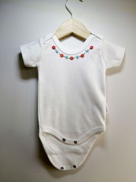 This bodysuit is exclusively embroidered for your baby. It is a unique present for women who have just given birth, a lovely bodysuit for the new member of your family. The fabric is 100% organic cotton so that you can use it on your baby with peace in mind.

#bodysuits #bodysuitsforbabies #bodysuitsforbabyshower #newbornbodysuits #cutebodysuits #personalizedbodysuits #customembroidered Embroidered Onesie Girl, Embroidered Onesie, Diy Baby Clothes, Embroidered Bodysuit, Baby Embroidery, Baby Frocks Designs, Embroidery On Clothes, Personalized Embroidery, Newborn Outfit