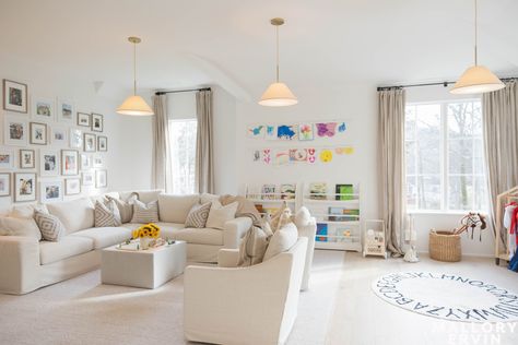 Playroom In Family Room, Half Living Room Half Play Area, Family Playroom Design, Bonus Room With Play Area, Lounge Room Playroom, Media Playroom Combo, Elegant Playroom Ideas, Sofa For Playroom, Toy Set Up In Living Room