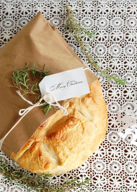 Rosemary Olive Oil Bread. We made this last year instead of cookies and people have been hinting to me all year that they hope we give some to them again this year. I cut loaves in half to make 8 loaves per batch for gift giving. Cost: $0.18 a loaf Rosemary Olive Oil Bread, Bread Gifts, Rosemary Olive Oil, Olive Oil Bread, Rosemary Bread, Bread Packaging, Olive Bread, Savory Bread, Artisan Bread