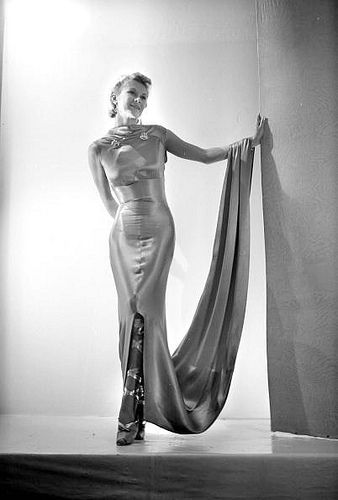 Model in silk charmeuse evening dress with ballet style shoes by Schiaparelli, photo by Boris Lipnitzki, 1937 | Flickr - Photo Sharing! 1930s Glamour, Schiaparelli Dress, Vintage Schiaparelli, Vintage Fashion 1930s, Gown Gold, Model Magazine, Ad Magazine, Elsa Schiaparelli, 30s Fashion