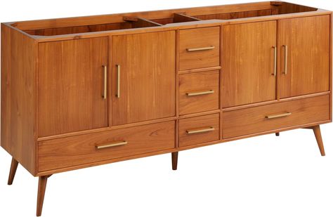 PRICES MAY VARY. Covered under Signature Hardware's 25 year limited Constructed from teak Free standing installation – vanity is seated on the floor with wall anchors 4 door design provides easy access to storage spaces 5 full extension drawers with soft-close hinges allow for organized storage space Give your shared space a mid-century modern update with the 72" Novak Vanity. Built from natural teak, functional shapes and clean lines allow the organic materials to shine for a warm, inviting fin Mid Century Bathroom Design, Mid Century Modern Bathroom Tile, Small Mid Century Bathroom, Mid Century Modern Bathroom Small, 70’s Bathroom, Mid Century Bathroom Remodel, Double Vanity Cabinet, Mid Century Bathroom Vanity, Mcm Bathroom