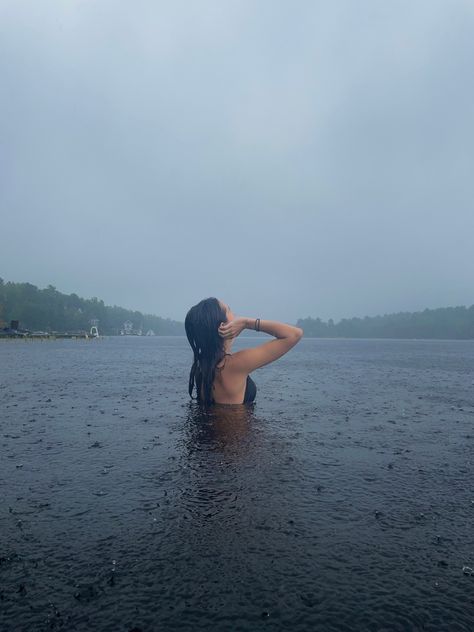 summer rain lake aethetic muskoka cloudy swim pose swimsuit tan brunette black fit back Tan Brunette, Rainy Lake, Lake Aesthetic, Lake Swimming, Daughter Of Poseidon, Lake Photoshoot, Summer Rain, Lake Pictures, Summer Plans