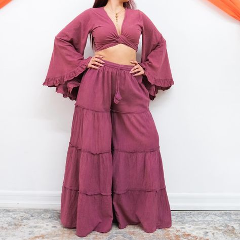 Flow freely in boho bliss with these wide-leg tiered pants and ruffle-sleeve top ensemble 🌸✨ https://karmanepalcrafts.com/products/flowy-tiered-pants #bohohippiechic #widelegpants #flowy #flarepants #bohemianstyle #plussizefashion #ootdfashion #springfashion #summeriscoming Tiered Pants, Hippie Fashion, Summer Trends Outfits, Boho Hippie Chic, Pants Cotton, Flowy Pants, Ruffled Sleeve Top, Bell Bottom, Summer Trends