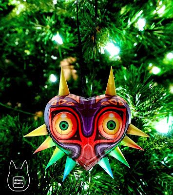 The Legend of Zelda : Majora's Mask Papercraft Ornament | Paperized Crafts Nerdy Christmas Ornaments, Zelda Ornament, Make Your Own Pokemon, Paperized Crafts, Mask Papercraft, Nerdy Christmas, Legend Of Zelda Majora's Mask, Silhouette Ornaments, Geeky Craft