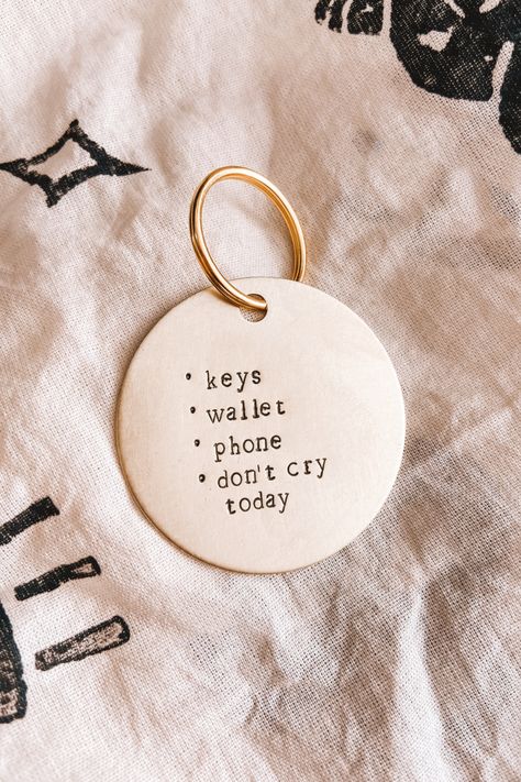 this keytag says Keys, Wallet, Phone, Don't Cry today. Tags are 2” wide and make for a good bag tag, keychain or mirror hanger. Funny Keychain, Handmade Gift Ideas, Mirror Hangers, Clay Stuff, Keychain Handmade, Key Wallet, Dont Cry, Bag Tag, Best Bags