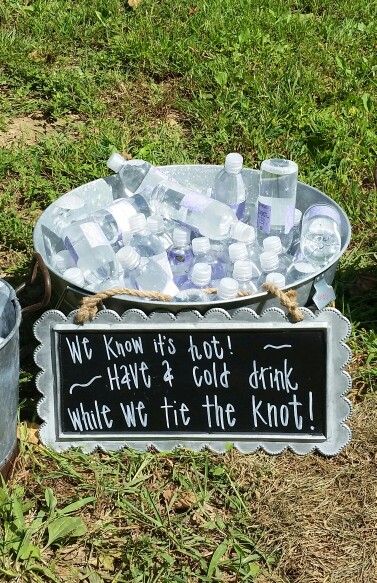 Water display for a hot summer outside wedding ! Outdoor July Wedding Ideas, Wedding Themes Summer Outdoor, Water At Wedding Ceremony, Water Display Ideas, Lake Wedding Theme Ideas, Water Station Wedding Ceremony, Summer Wedding Drink Station, Summer Outside Wedding Ideas, Wedding Water Station Outdoor Ceremony