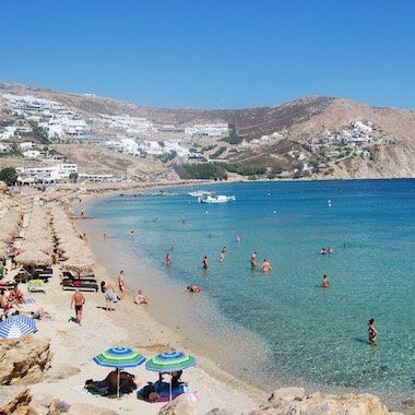 PARADISE BEACH, Mykonos | 2020 Guide Paros Beaches, Santorini Beaches, Mykonos Beaches, Greece Beach, Mykonos Town, Mykonos Island, Greek Isles, Paradise Beach, Venice Italy Travel