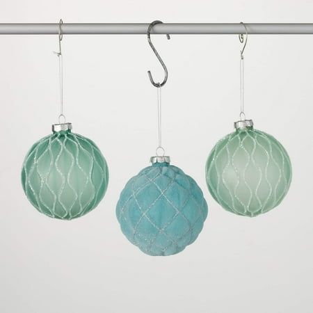 An eye-catching way to brighten up your coastal Christmas tree, this aqua ball ornament is reminiscent of polished sea glass. The patterned aqua surface and rope detailing evoke images of ocean breezes and beaches, perfect for those who love the simplicity of coastal decor. Add it to your collection of nautical ornaments and make your holiday space feel like a beach getaway. Size: 4"L x 4"W x 4"H.  Color: Blue. Aqua Blue Christmas Decor, Turquoise Christmas Decor, Nautical Christmas Tree, Nautical Christmas Ornaments, Aqua Christmas, Sea Glass Christmas, Nautical Ornaments, Beach Christmas Decorations, Beach Christmas Ornaments