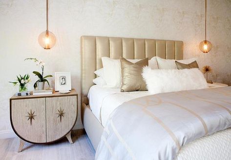 Consider hanging pendants above nightstands Silk Headboard, Serene Room, Champagne Bedroom, Small Chandeliers, Grey And Gold Bedroom, Hanging Bedroom Lights, Gold Duvet, String Lights In The Bedroom, Hanging Bedroom