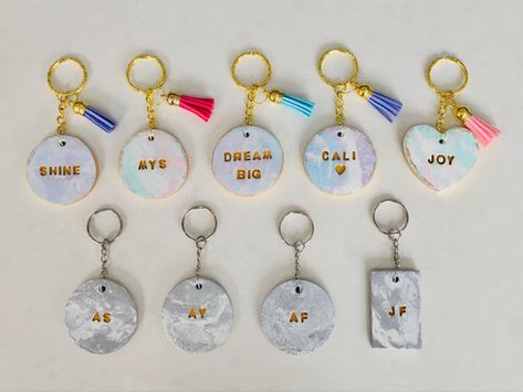 DIY air dry clay keychains - keychains with tassels - word keychains - personalized keychains - marbled air dry clay - stamped air dry clay Air Dry Clay Keychain Name, Dry Clay Keychain, Air Dry Clay Keychain, Crayola Air Dry Clay, Money Making Projects, Personalized Keychains, Clay Inspo, Clay Keychain, Clay Works