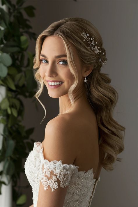 This stunning bridal half up half down hair design creates a harmonious blend of elegance and romance. The intricate twists and soft waves beautifully frame the face while allowing long locks to cascade down, perfect for any bride. Ideal for showcasing delicate hair accessories, this hairstyle enhances the overall bridal look with timeless grace. Discover how to make your special day unforgettable! Waved Bridal Hair, Natural Bridal Hairstyles For Long Hair, Bridal Hair With Jewels, Volumous Bridal Hair, Face Framing Hairstyles Wedding, Bridal Hair Timeless, Bride Hair Styles Half Up Half Down, Down Wedding Hairstyles With Headpiece, Wedding Hairstyles Half Up Half Down With Veil Medium Lengths