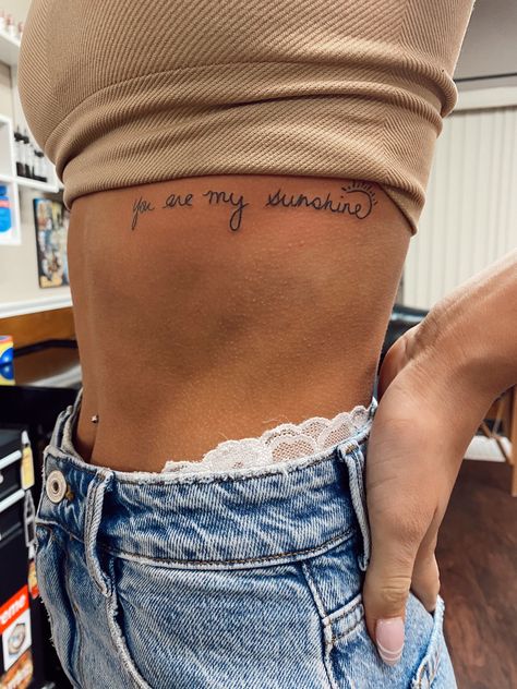 Simple Classy Tattoos For Women, Mom And Daughter Tattoos You Are My Sunshine, Country Meaningful Tattoos, Cute Tattoos On Ribs, Tattoos For Women Deep Meaning, Family Ankle Tattoos For Women, Tattoos You Are My Sunshine, Your The Sun To Me Tattoo, Mother Daughter Tattoos Ribcage