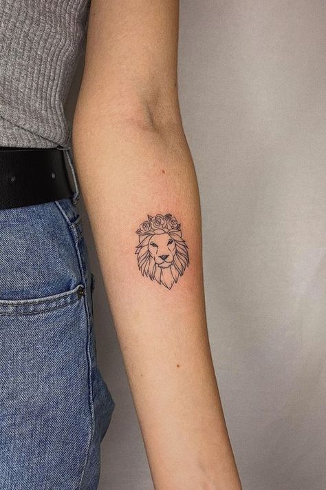 27 Minimalist Lion Tattoo: Subtle Elegance and Symbolism Leo Sisters Tattoo, Small Leo Lion Tattoo, Lion Tattoo Design Minimalist, Petite Lion Tattoo, Girly Leo Tattoo, Leo Tattoo Lion, Best Leo Tattoo Designs, Zodiac Tattoos For Leo, Leo Fire Sign Tattoo