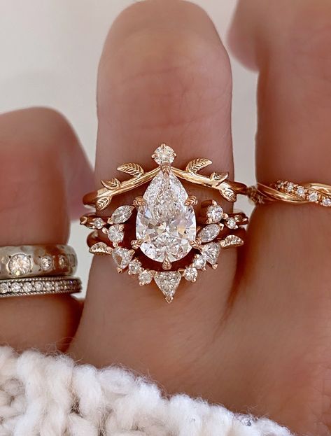 caption:Shown with 1.5ct pear Rose Gold Engagement Ring Stack, Vintage Pear Cut Engagement Rings, Bride Wedding Ring Gold, Wedding Rings Engagement Set, Forest Fairy Engagement Ring, Whimsical Rings Engagement, Yellow Gold Wedding Ring Stack, Nontraditional Engagement Rings Vintage, Engagement Rings Whimsical