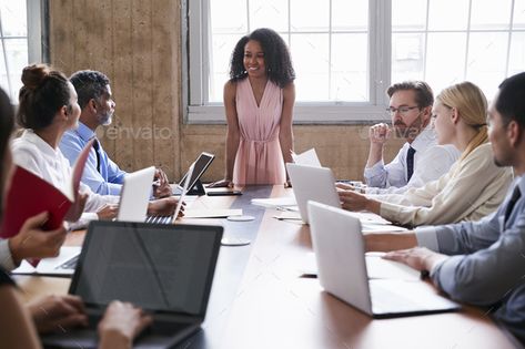 Black businesswoman addressing colleagues at a board meeting by monkeybusiness. Black businesswoman addressing colleagues at a board meeting#addressing, #businesswoman, #Black, #colleagues Urban Design Presentation, Pci Dss, Presentation Skills Training, Middle Management, Digital Security, Presentation Board Design, Presentation Boards, Business Process Management, Architecture Presentation Board