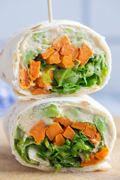 These Roasted Sweet Potato Wraps with Honey Mustard are easy to throw together and full of flavor! They're packed with hummus to add some protein and the sweet potato and honey mustard go together so well. The lettuce adds some crunch and keeps these vegan wraps nice and fresh. Make them for lunch and you'll be looking forward to them all morning! #wraprecipe #vegan #veggiewrap #hummuswrap #easylunch Potato Wrap, Hummus Wraps, Sweet Potato Wrap, Healthy Vegetarian Lunch, Potato Hummus, Potato Sandwich, Sweet Potato Hummus, Work Recipes, Hummus Wrap