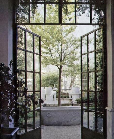 Located in a grand townhouse in the Beyoglu district of Istanbul, Asli Tunca's shop is a showcase for her distinctive collection of furnishings and objects, one-of-a-kind antiques, modern pieces, and handmade Ottoman-inspired reproductions—all exuding a rarified vision of restrained luxury. Black French Doors, Steel French Doors, Steel Doors And Windows, Steel Entry Doors, Steel Windows, 카페 인테리어 디자인, Residential Doors, Open Door, Hus Inspiration