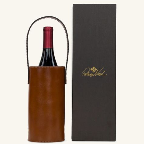 Greet Your Party Host With Style. This Wine Carrier Is Crafted With The Same Attention To Detail And Supple Leather We Use In Our Nash Bags. It Also Comes With A Handsome Gift Box. 100% Full-Grain Leather Case No Closure Approx. 8 1/4"(H) X 4/14"(W) Strap Approx. 6" Wine Carrier Pattern, Leather Wine Carrier, Carrier Pattern, Wine Bottle Carrier, Wine Carrier, Wine Case, Bottle Carrier, Wine Tote, Leather Art