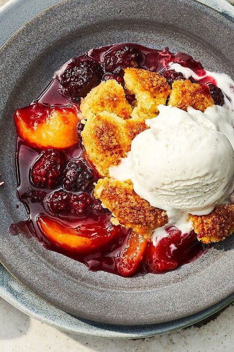 Let the farmers market be your guide when it comes to this sweet cobbler—any mixture of fresh summer stone fruits and berries can be cooked down to make the perfectly sweet-tart, jammy filling to accompany your vanilla mascarpone biscuits. From peaches to blackberries to raspberries, this summer dessert recipe is extremely versatile and sure to impress any guest.#dessertrecipes #dessertideas #dessertdishes #cobbler #cobblerrecipes #summerrecipes #fruitrecipes Ginger Biscuits, Fruit Cobbler, Biscuits Recipe, Fruit Filling, Recipes To Make, Stone Fruit, Peach Cobbler, Healthy Sweets, Summer Fruit