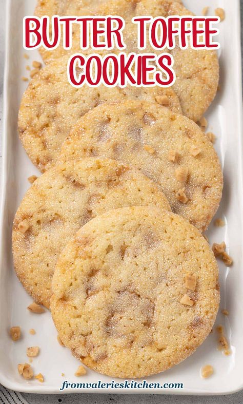 These Butter Toffee Cookies are irresistibly soft, chewy and crispy all at the same time. They're rich, buttery and loaded with crunchy toffee bits. Perfect for Christmas cookie trays but delicious anytime of year! Homemade Toffee Cookies, Butter Brickle Cookies, Pressed Butter Cookies, Cookies Using Toffee Bits, White Trash Cookies, Toffee Chip Cookies, Heath Bits Recipes, Crispy Cookie Recipes, Toffee Bits Cookie Recipe