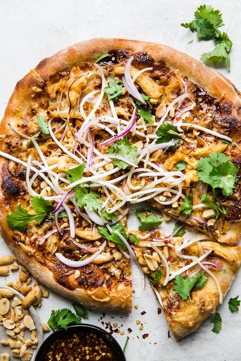 We took two of our favorite takeout meals and combined them because, really, who could blame us? Thus, we humbly present a completely delicious pad Thai-inspired Thai chicken pizza. Best Chicken Breast Recipes, Thai Pizza, Best Chicken Breast, Thai Chicken Pizza, Bbq Chicken Pizza Recipe, Chicken Pizza Recipes, The Modern Proper, Modern Proper, Bbq Chicken Pizza