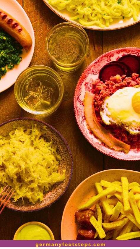 German cuisine including a sausage, fried egg with vegetables, sauerkraut, and fries on a wooden table. Food In Germany, Culinary Knowledge, German Christmas Food, Traditional German Food, Bratwurst Sausage, German Sausage, Popular Food, Food History, Food Articles