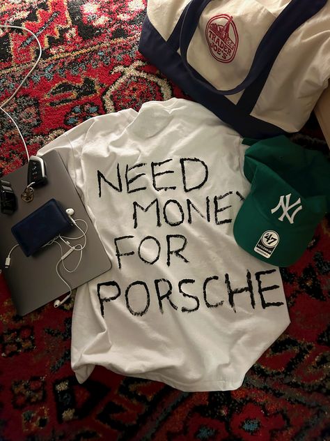 need money for porsche white t-shirt forest green baseball cap ny yankees blue Louis Vuitton wallet trader joes bag apple MacBook earbuds rug aesthetic Porsche Shirt, Need Money For Porsche, Need Money, Fashion Killa, Old Money, Classic White, Fitness Inspo, Graphic Shirts, Mood Pics