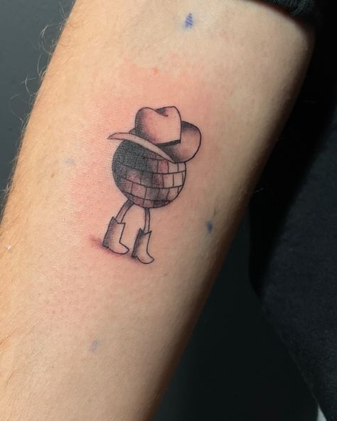 C O W G I R L 🪩 D I S C O . Little cowgirl🤠 disco ball 🪩 in black and grey. I adapted this design from just line work 🖊️to a semi realistic disco ball with a cowboy hat and cowboy boots . . Fun to make ideas into tattoos for clients and community to make a great tattoo . Thanks so much to Nicole for the opportunity and trust with this tattoo and understanding to make such a beautiful tattoo 🙏 . Done by : @jordan_f_inked 🖊️ At studio: @morethanhype 📍 . ✅For tattoo booking or enquiries DM @jor... Cowboy Head Tattoo, Boots Fun, Smiley Face Tattoo, Cowgirl Disco, Head Tattoo, Semi Realistic, Beautiful Tattoo, Head Tattoos, Line Work