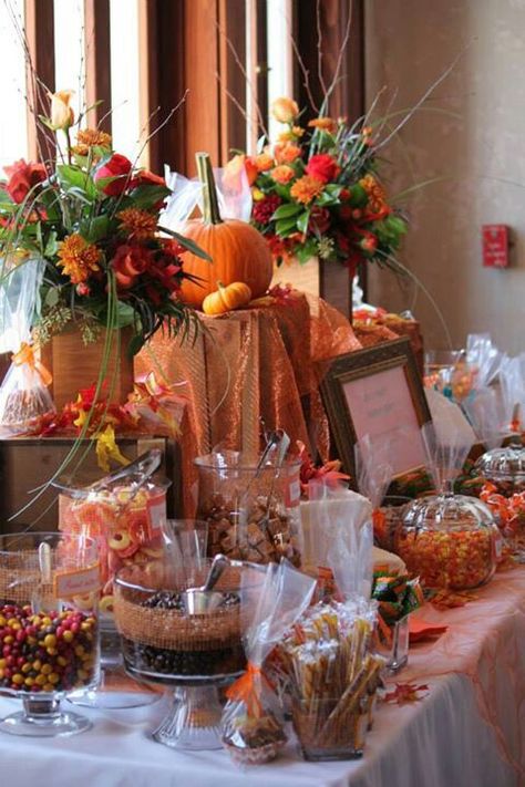 Fall candy favor table Fall Wedding Candy Table Ideas, Fall Candy Bar Wedding, Fall Wedding Candy Bar Ideas, Wedding Sweet Table Ideas Candy Buffet, Fall Candy Table Ideas, Halloween Wedding Candy Bar, Fall Bridal Shower Favors, Bridal Shower Candy Favors, Halloween Wedding Favors