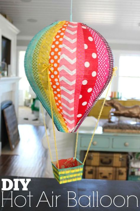 if you know me and DIY’s, you know you’re in for a long post! i’m not just going to show you how to make one hot air balloon, i’m going to show you how to make 17 different balloons!  3 or 4 times a y Ballon Pinata, Balloon Pinata, Hot Air Balloon Craft, Diy Hot Air Balloons, Hot Air Balloon Party, Hot Air Balloon Decorations, Balloon Crafts, Mini Balloons, Classroom Theme