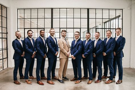 Summer wedding | modern wedding | white wedding dress | v-neck wedding dress | wedding dress with train | tan groom suit | navy groomsmen suit | mix'nmatch bridesmaids | wedding greenery | wedding florals Groom In Tan Groomsmen In Navy, Tan Suit Navy Tie, Sage Green Bridesmaid Dresses With Navy Groomsmen Suits, Brown Groomsmen Suits, Tan Groom Suit, Tan Groom, Navy Bridal Parties, Tan Suit Wedding, Navy Blue Groomsmen