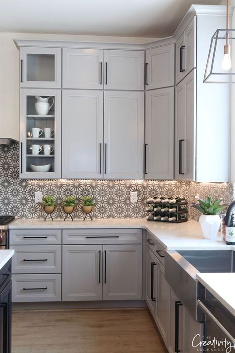 Kitchen cabinets painted with Benjamin Moore Shale Benjamin Moore Shale, Paint Color Trends, Kitchen Cabinets Painted, Kitchen Cabinet Trends, Серая Кухня, Cabinets Painted, Refacing Kitchen Cabinets, Kitchen Glass, New Kitchen Cabinets