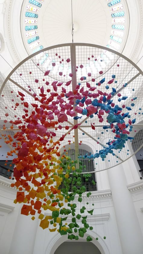 Giant, rainbow hanging installation of 1,000 origami spheres, fish and boats | Creative Boom Ceiling Art Installation, Origami Installation, Colorful Objects, Rainbow Hanging, Hanging Installation, Paper Installation, Origami Boat, Ceiling Art, Art Installation