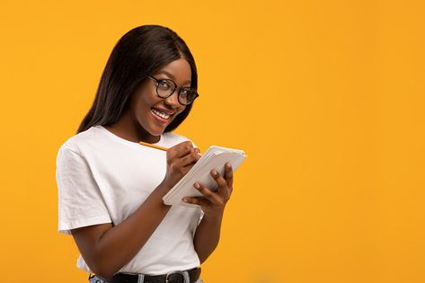 Woman In Glasses, Yellow Studio, Notepad And Pen, Woman With Glasses, Cricut Monogram, Event Poster Design, Standing Poses, Taking Notes, Young Black