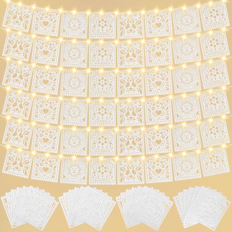 PRICES MAY VARY. Felt Authentic Mexican Design: our product includes 6 pieces of White Papel Picado banners and 6 pieces of 3 meters LED Fairy String Lights, each white Mexican banner pack includes 12 panels with 4 pattern designs per banner, providing a vibrant and festive atmosphere; Add a touch of Mexico to your parties and wedding celebrations with these white Papel Picado banners Generous Size: each White Papel Picado banner measures approximately 9.8 ft/ 3 meters in length, offering a tota White Mexican Theme Party, Elegant Mexican Theme Party, Mexican Wedding Theme, White Papel Picado, Mexican Banner, Mexican Wedding Decorations, Mexican Themed Party, Picado Banner, Mexican Theme Party Decorations