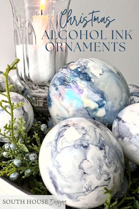 This holiday season, transform your home into a festive wonderland with our DIY alcohol ink Christmas ornaments! With this inexpensive and easy Christmas craft, you’ll be able to create stunningly beautiful decorations in no time. So, why wait? Dive into our blog post for step-by-step instructions and get ready to impress your friends and family with your newfound crafting skills! Glass Baubles Ideas Diy Ornaments, Geode Ornaments Diy, Frosted Ornaments Diy, Marbled Ornaments Diy, Diy Filled Ornaments, Diy Glass Ornament Ideas, Dipped Ornaments Diy, Diy Clear Glass Ornament Ideas, Glitter Ornaments Diy Mod Podge