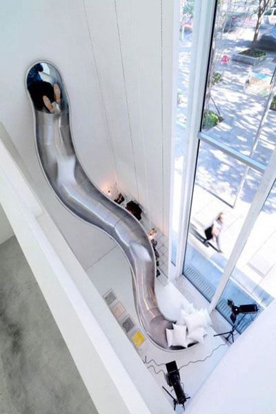 Slides, swings and other things we wish were in our home Gömda Rum, Skjulte Rum, Indoor Slide, Hiasan Dalaman Rumah, Balcony Pool, Indoor Slides, Stairs Design Modern, Hidden Rooms, Modern Stairs