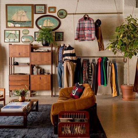 Vintage Store Interior Design, Figma Inspiration, Vintage Store Aesthetic, Small Clothing Store Interior, Statement Couch, Merch Display, Urban Backyard, Future Shop, Garage Studio