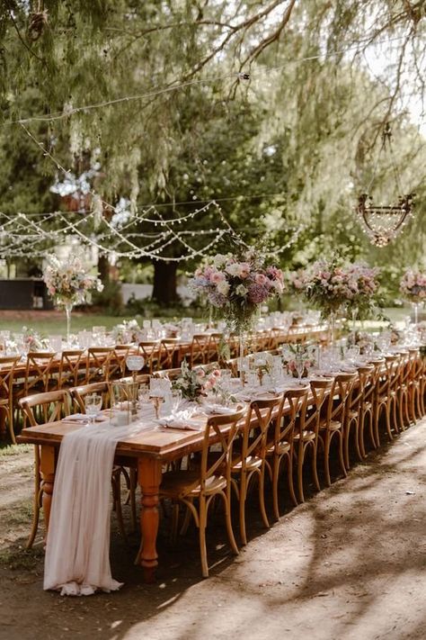 10 Beautiful Ways to Decorate Long Tables — Luxury Weddings UK Long Table Wedding Decor Romantic, Long Table Outdoor Wedding, Two Long Tables Wedding Reception, Long Table Wedding Reception Layout, Wooden Long Table Wedding, Long Wooden Wedding Tables, Wedding Long Table Settings, Long Wooden Table Wedding Decor, Long Table Wedding Layout