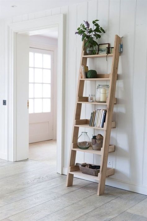 Bookshelf from an Old Ladder24 Minimalist wooden ladder shelf with books, plants, and decor against white paneled wall in bright, modern home interior. | Sky Rye Design Diy Ladder Bookshelf, Diy Ladder Shelf, Ladder Shelf Decor, Leaning Ladder Shelf, Ladder Shelf Diy, Leaning Shelf, Leaning Ladder, Diy Regal, Bookcase Diy