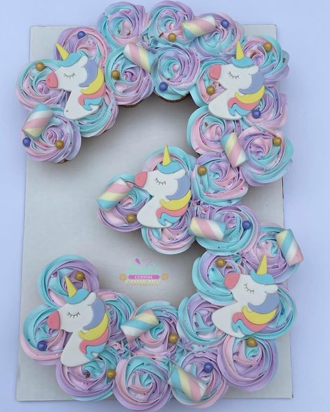 Unicorn cake, #3 cake, gumpaste, marshmellows Unicorn Cupcake Birthday Cake, Unicorn Cupcake Cake Ideas, Cupcake Cakes Rainbow, Rainbow Unicorn Cupcakes Ideas, Rainbow Unicorn Cupcake Cake, Unicorn Cupcake Cake Pull Apart, Unicorn Birthday Cake And Cupcakes, Pull Apart Unicorn Cake, Unicorn Birthday Party Cupcakes