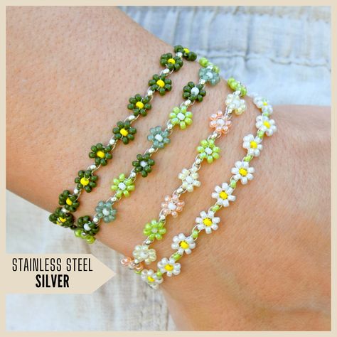 This handmade bracelet will complete your outfit! You can mix and match it with other bracelets, or wear it on its own. It's elegant, minimalist and adorable. S P E C I F I C A T I O N S Materials: * High-quality Miyuki seed beads 11/0 (1,3 x 2,1 mm) * Silver-colored stainless steel components * Strong nylon Miyuki beading thread  Length:  This adjustable bracelet measures approximately 15.5 - 19.5 cm (6.1 - 7.7 inches) in length, ensuring a perfect fit for your wrist. Shipping: Every order come Autumn Bracelet, Beads Pattern, Seed Bead Pattern, Spring Bracelet, Beading Thread, Daisy Bracelet, Beaded Jewellery, Happy Gifts, Handmade Flower